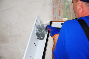 Which garage door motor safety features should I keep in mind?
