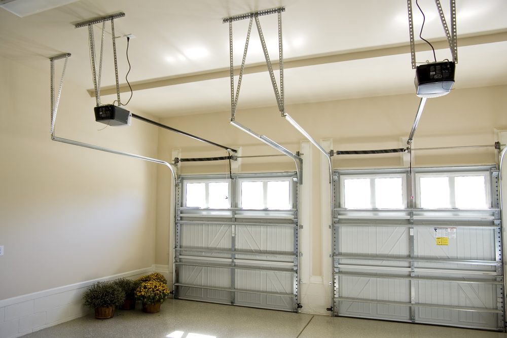 Which garage door motor safety features should I keep in mind?