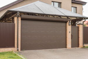 How do I adjust garage door tracks for smoother movement