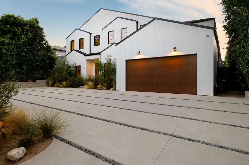 Why does a garage door open unevenly